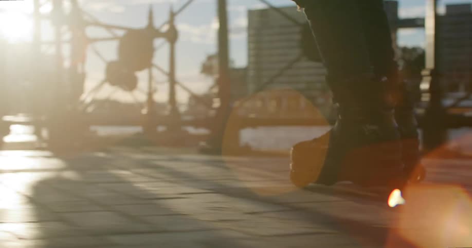 A person is rollerblading on a sunny day