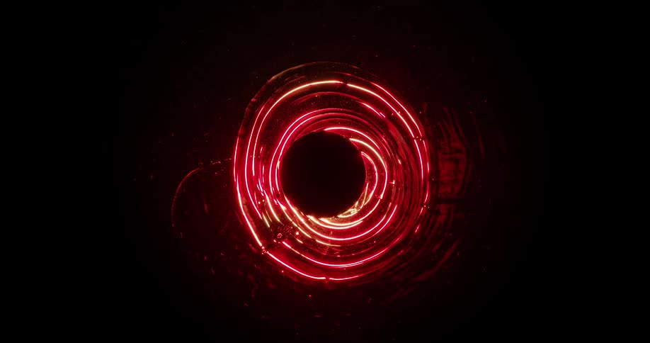 Hole forming in the middle of a liquid with a red neon light