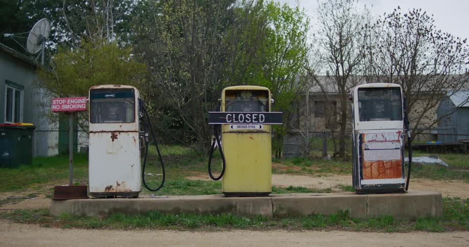 Abandoned gas pumps in a rural area