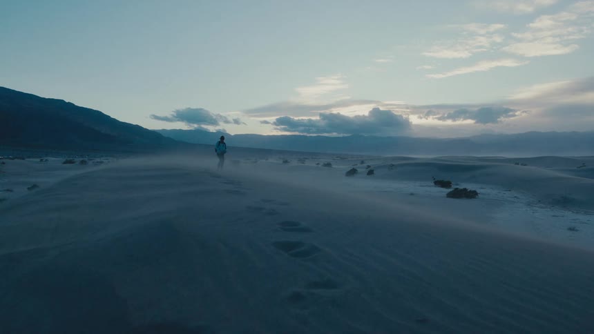 A man is hiking in Death Valley National Park