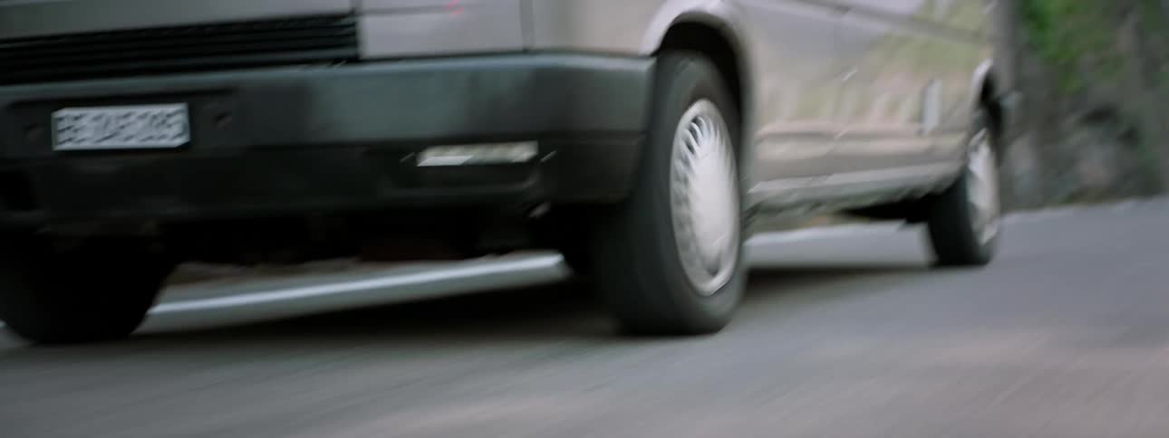 A moving car suffers a tire out