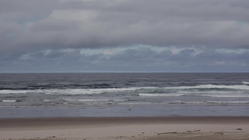 A deserted beach on a cloudy day