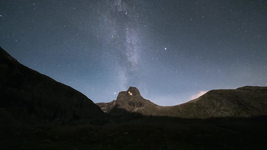 Night sky landscape with constellations in timelapse
