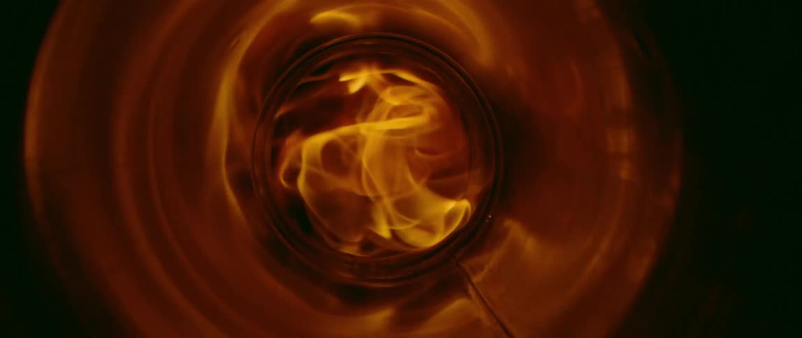 Fire and flames passing through a metal tunnel