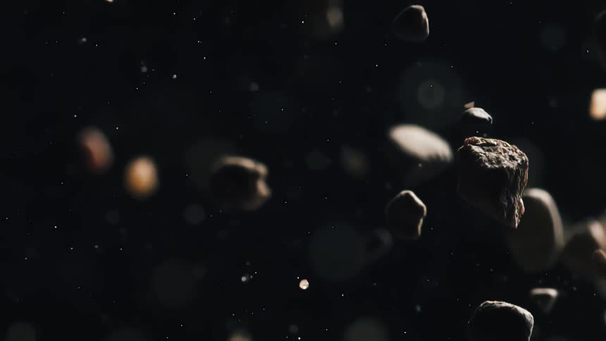 Nuts and seeds falling in slow motion