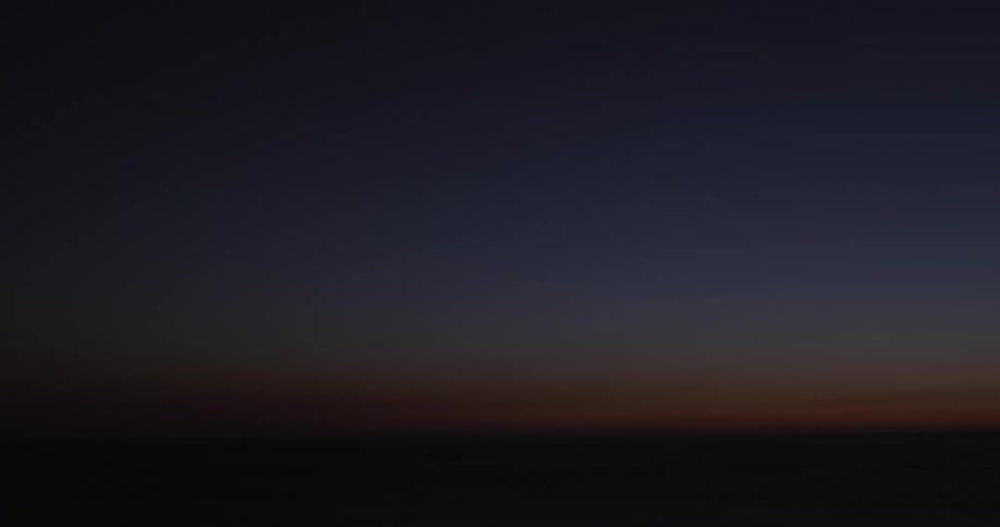 The sky gets darker in the final moments of a sunset