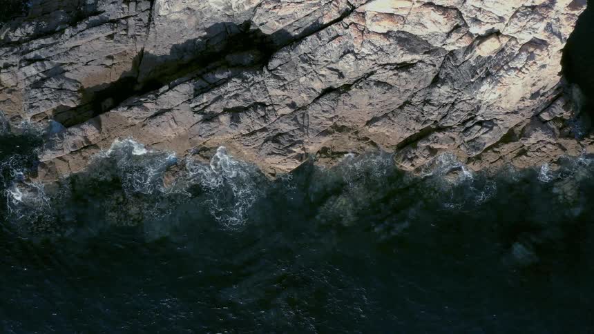 Clear greenish ocean and amidst the rocks in cenotes
