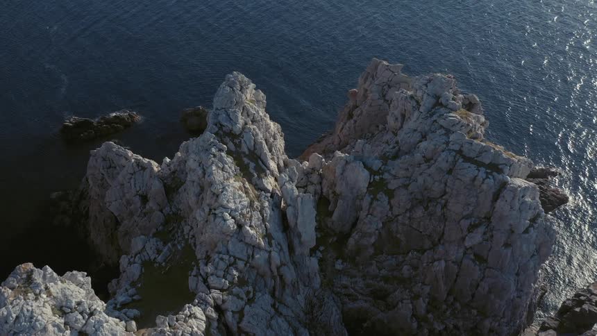A rocky mountain on a coast