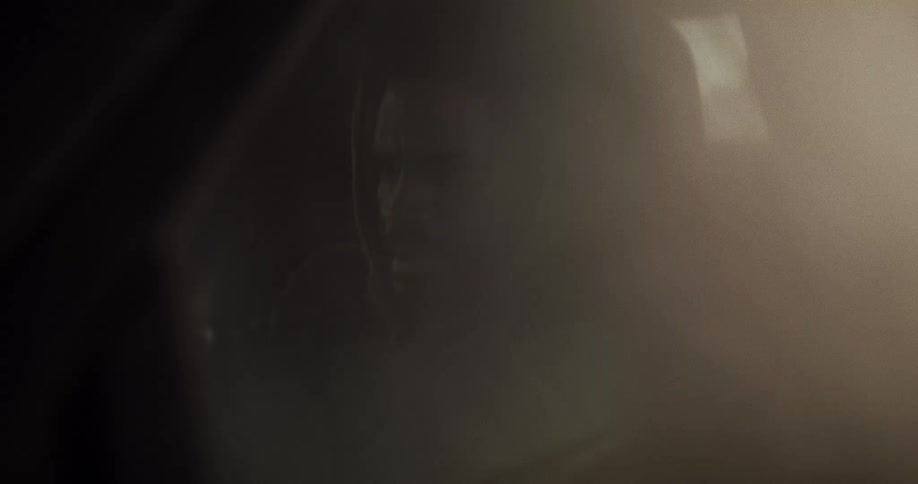 A man throws up clouds of dust while driving