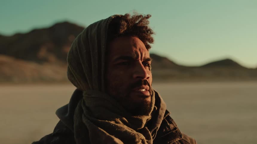 A clip ofa man out in the desert