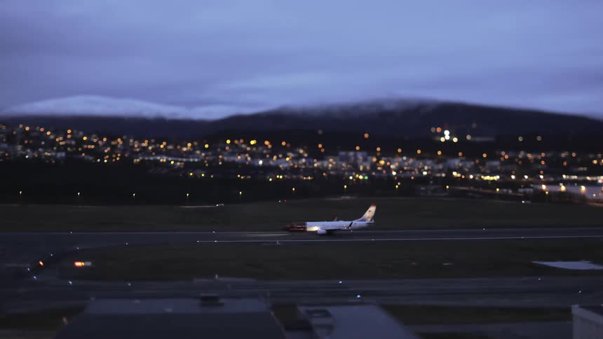 An airplane is on a runway preparing to take off