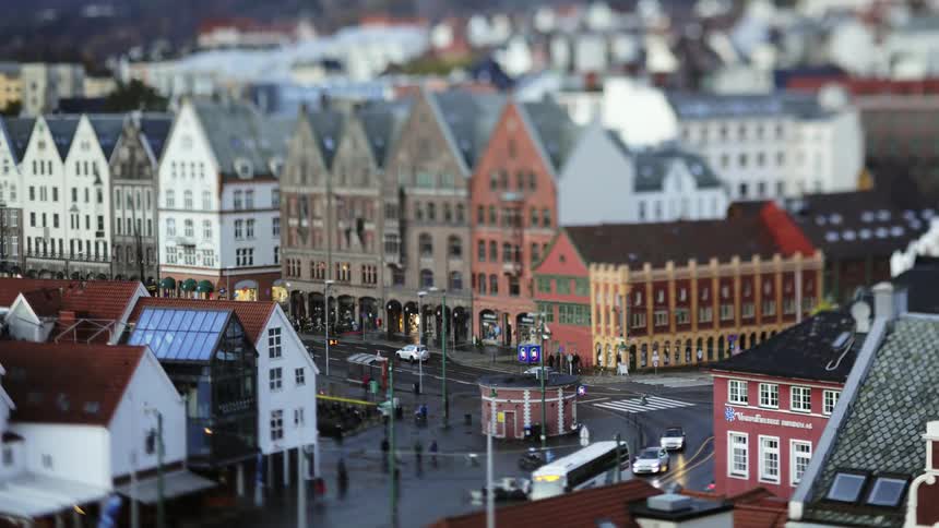 Cars drive through the intersection