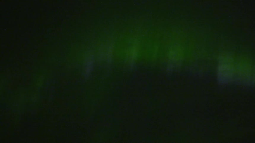 A night clip of a glowing green light