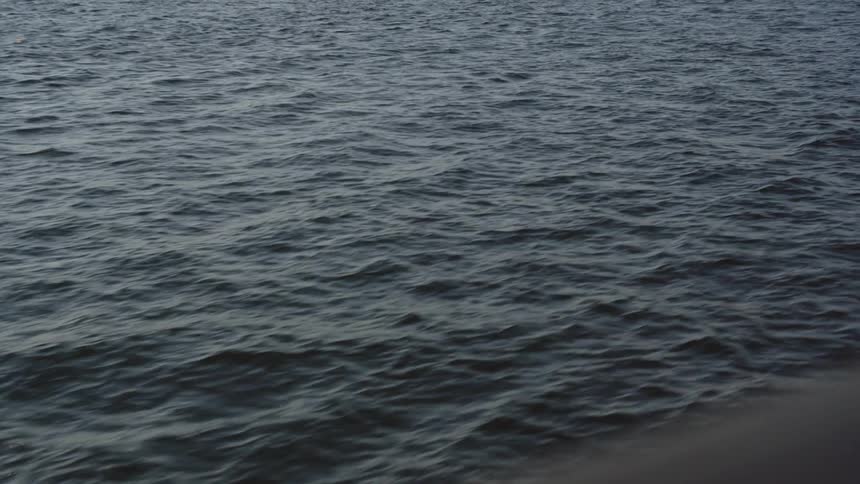 A placid ocean passing by