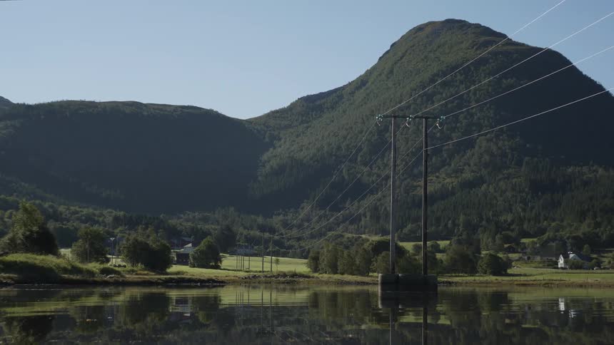 Power lines cross the lake
