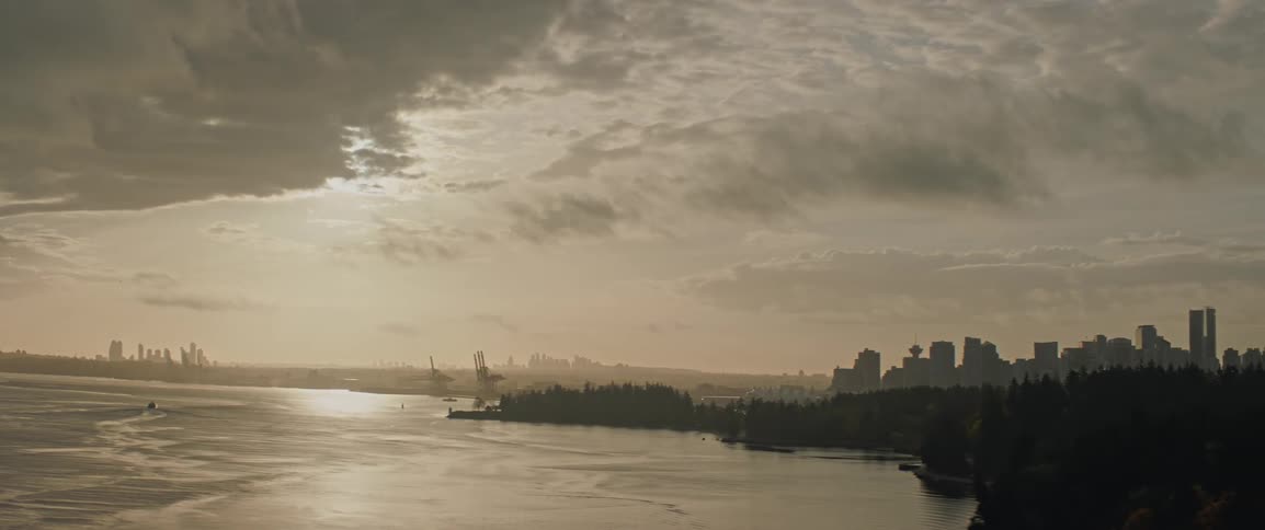 Vancouver's downtown skyline and Stanley Park seen at sunrise