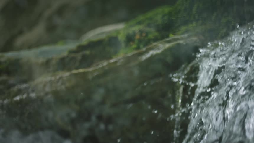 Water falls off the waterfall