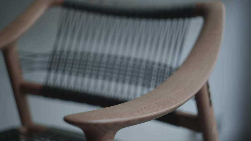 Wooden chair with leather upholstery in an indoor environment