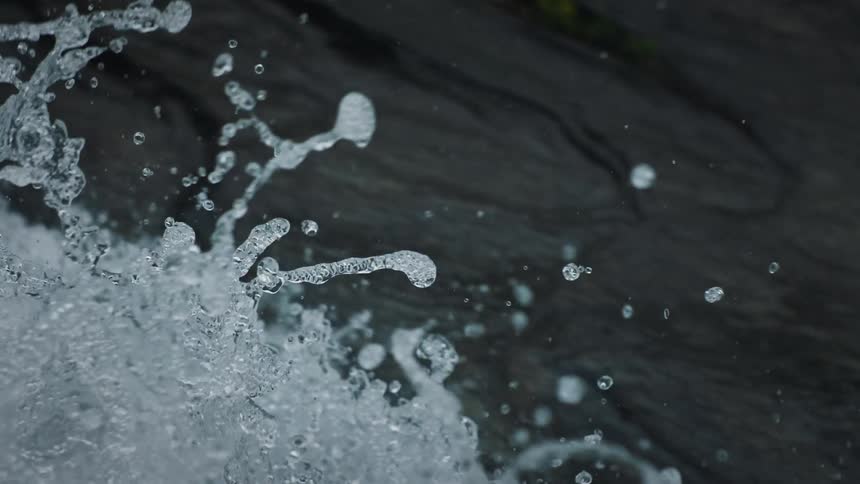 Water crashes over rocks