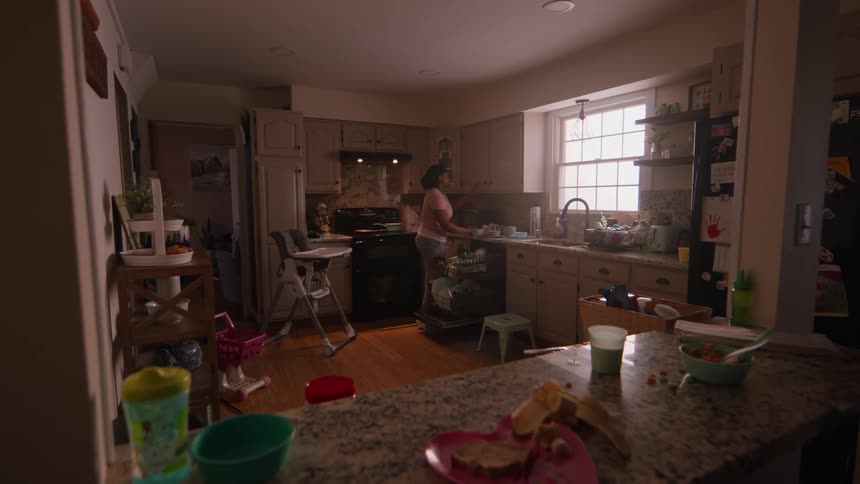 A clip of a woman arranging the house