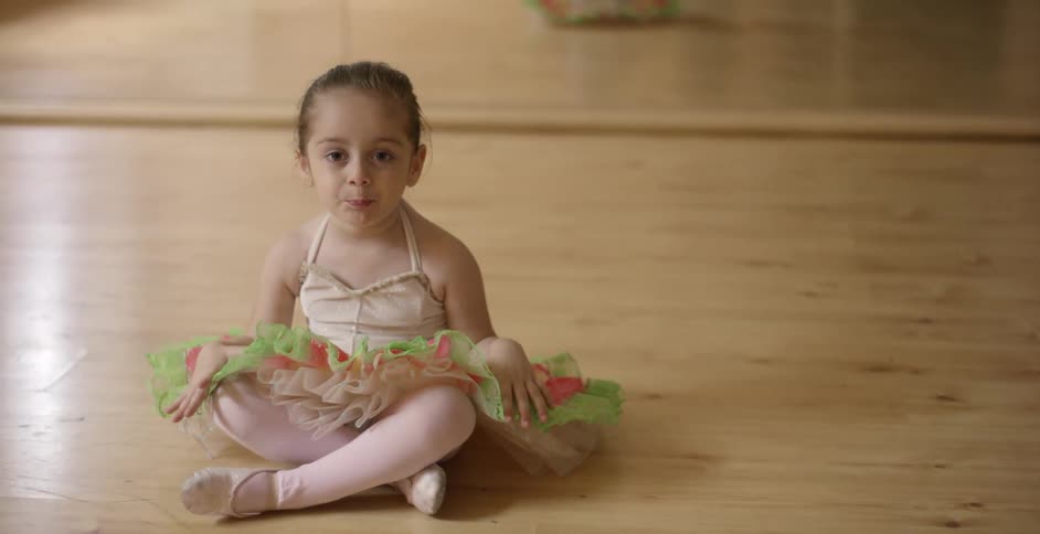 A kid wearing a tutu