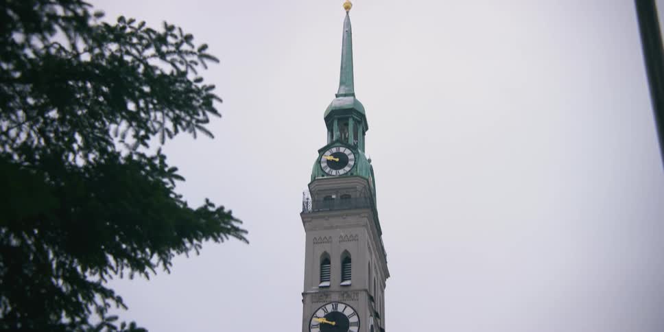 A church bell tower with clocks