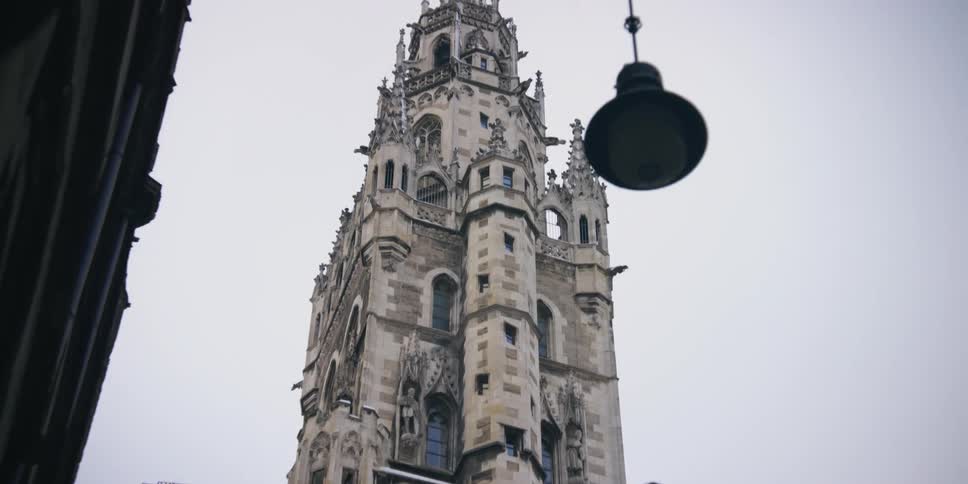 Cathedral with a huge tower on a cloudy day