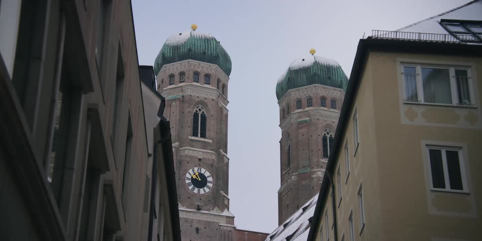 A clock tower in an urban area
