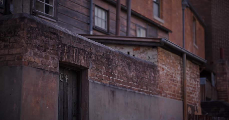 Wooden brick side facade of houses in a residential neighborhood