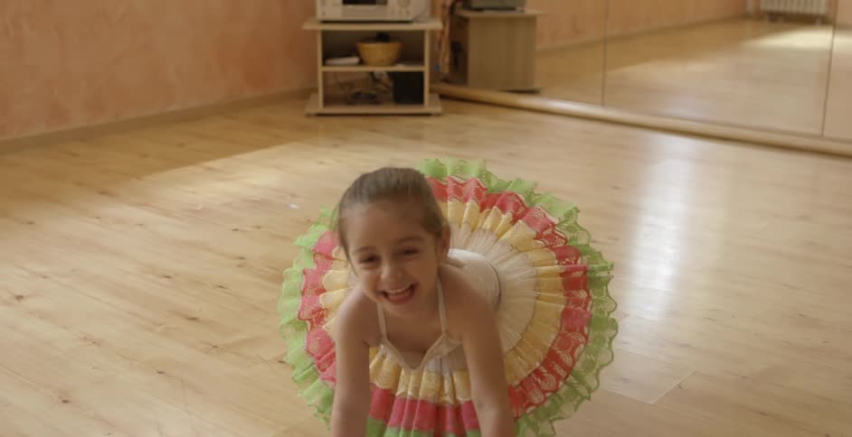 A kid wearing a tutu