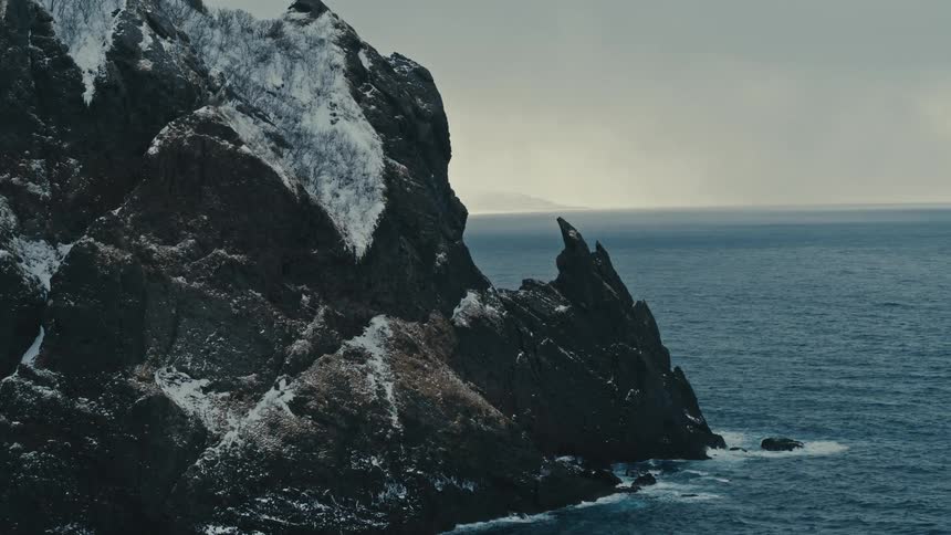 A mountain is in the ocean