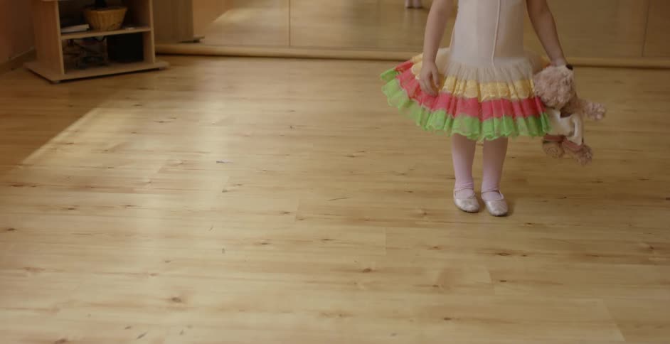 A kid wearing a tutu