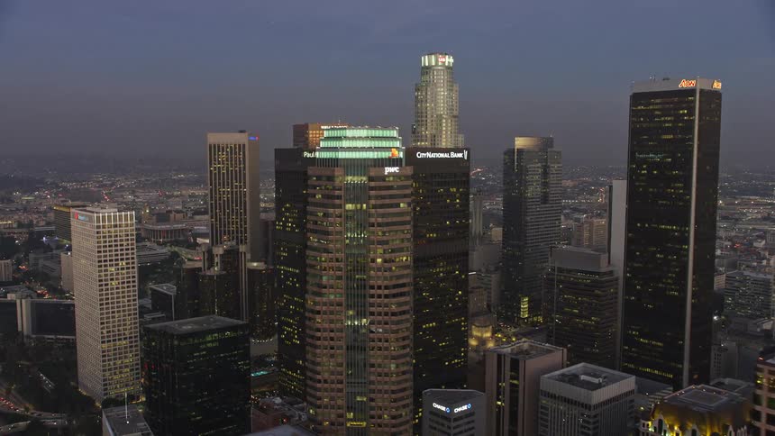 The sun is setting on the big city