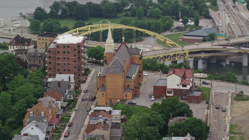 Aerial panorama of a church on a hill by the sea