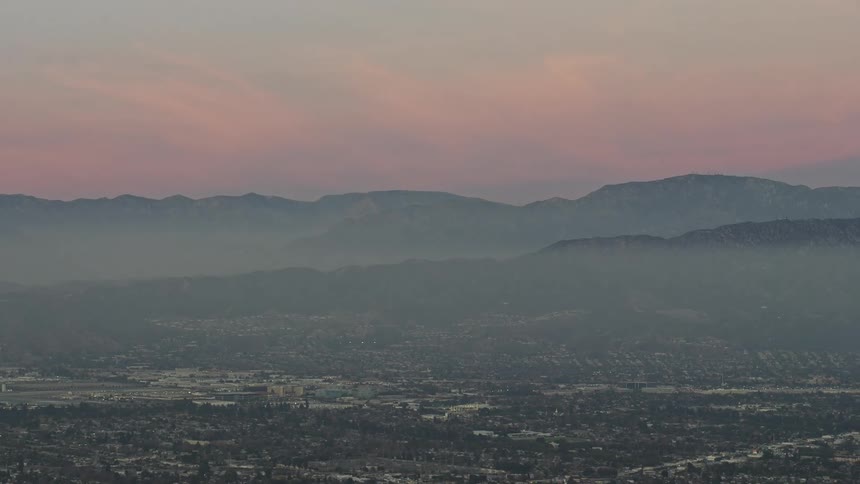 A large suburban area in a mountain valley