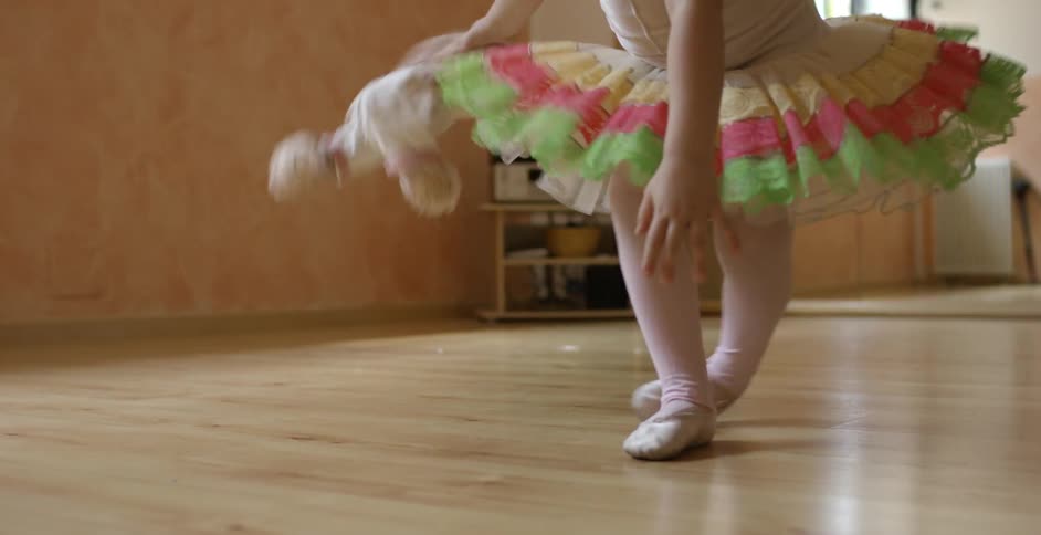 A kid wearing a tutu