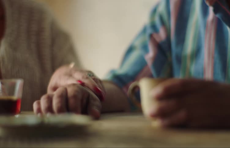 Two elderly people engaging with each other