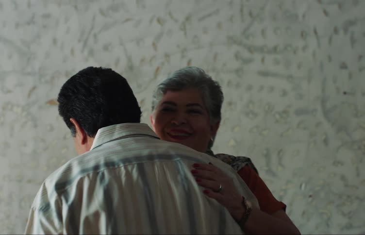 Elderly couple dancing happily
