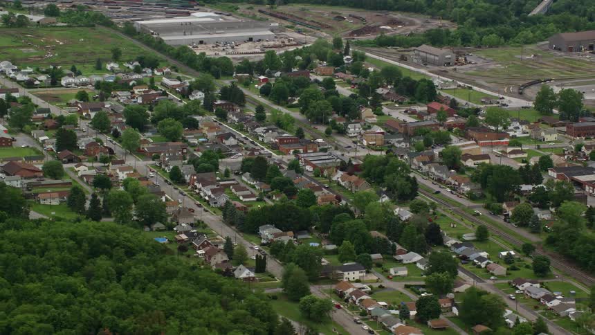 Aerial view of a small town near a small industrial complex
