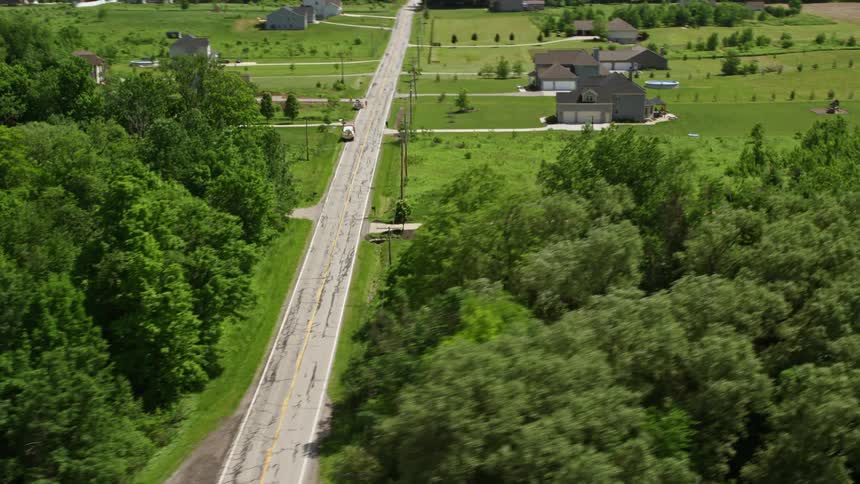 Aerial panorama of residential houses in rural locations by a lake