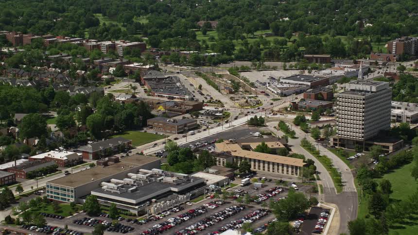 A forest surrounds the city