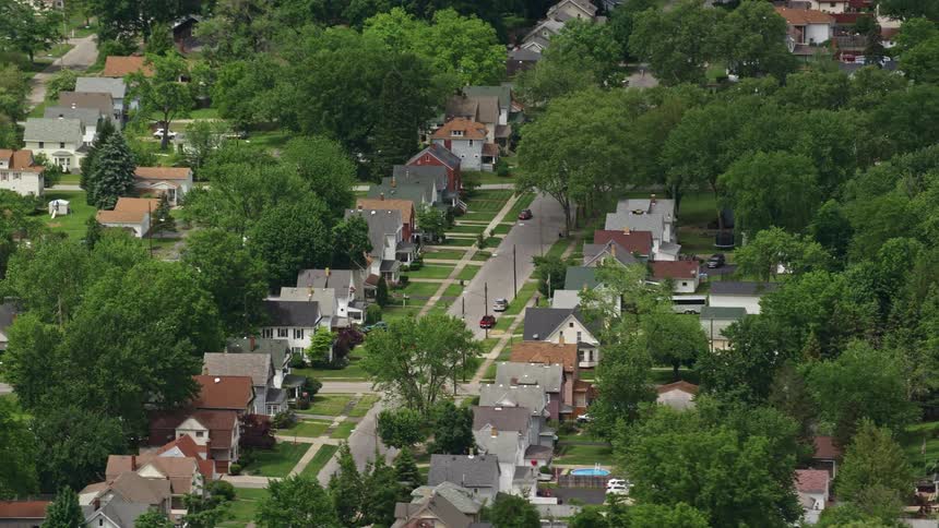 An aerial clip of a neighborhood during spring