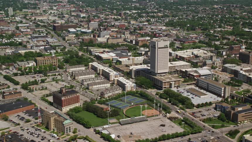 A baseball field is in the middle of the city