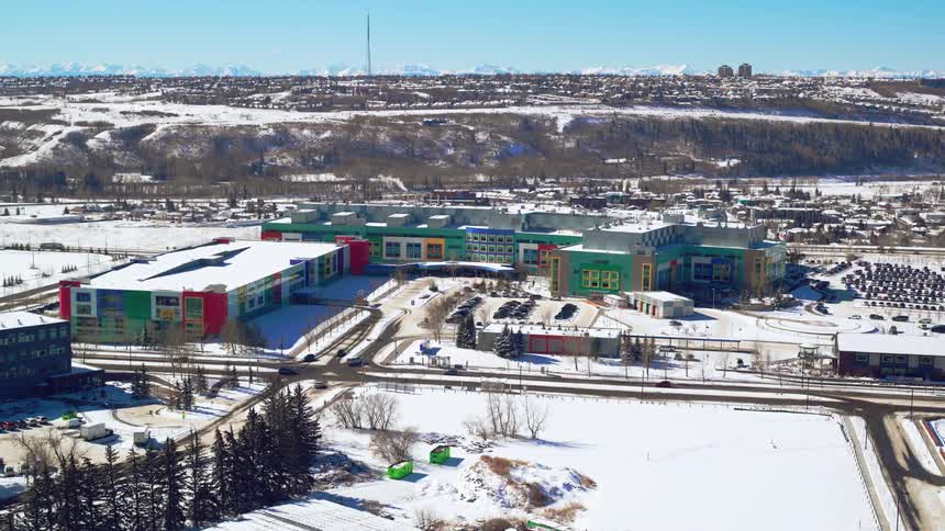 Slow fly-by of a modern children's hospital in the winter