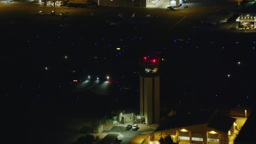 A night footage of a plane on the runway