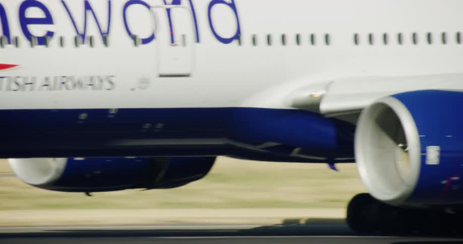Large commercial airplane lands on airport runway