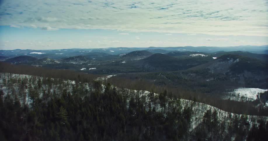 A winter clip of a summit in the woods