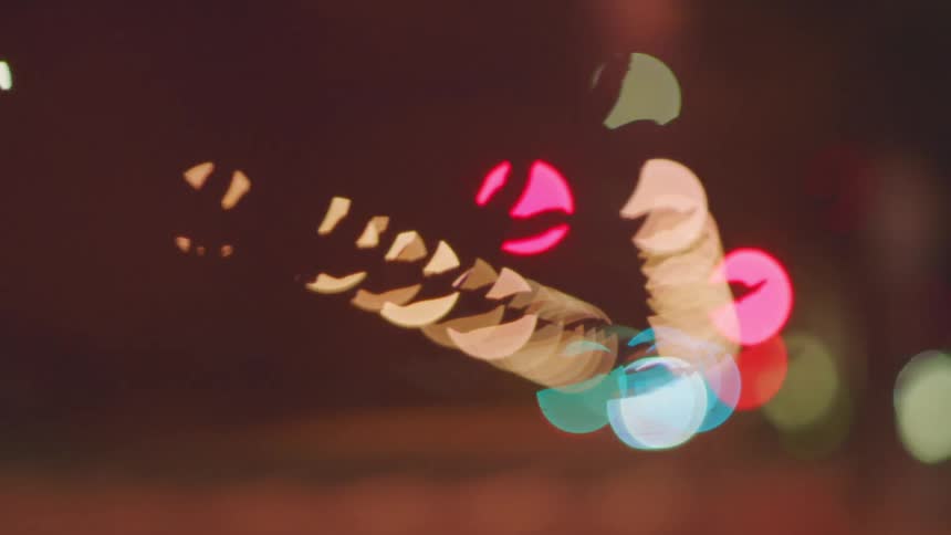 A view of some blurry lights in a city
