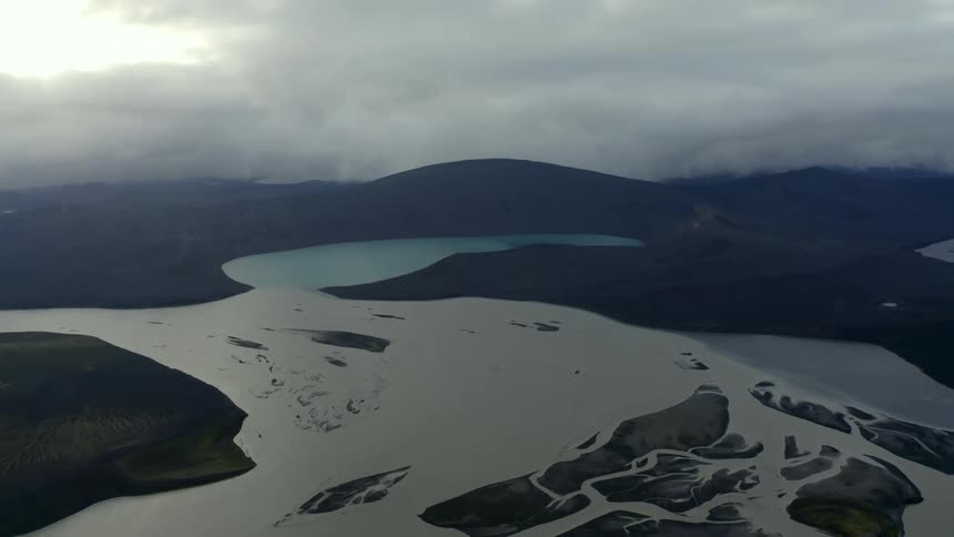 Aerial view of a large icelandic river on a cloudy day