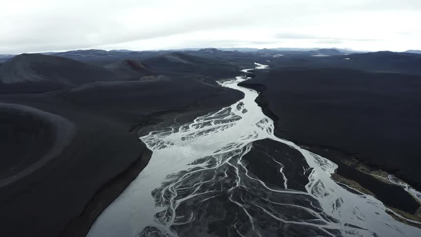 A frozen river in a mountain valley